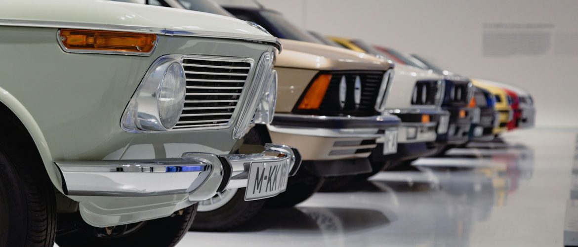 selective focus photography of assorted-color vehicles