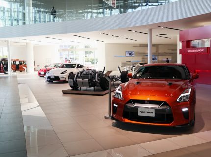 a car showroom filled with lots of cars