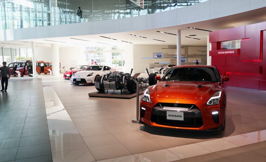 a car showroom filled with lots of cars
